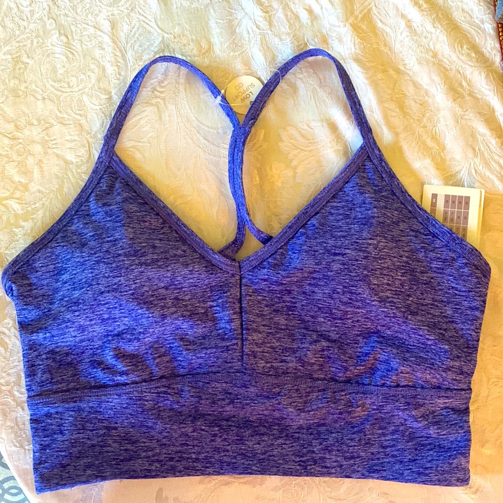 NWT Women’s blue Calla sports bra size S. Low support.